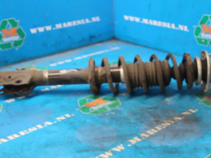 Front shock absorber rod, left Daihatsu Sirion