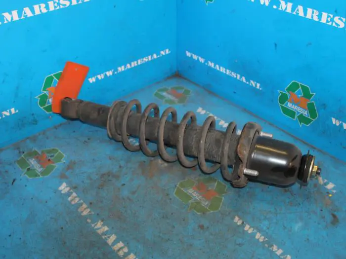 Rear shock absorber rod, left Toyota Corolla Verso