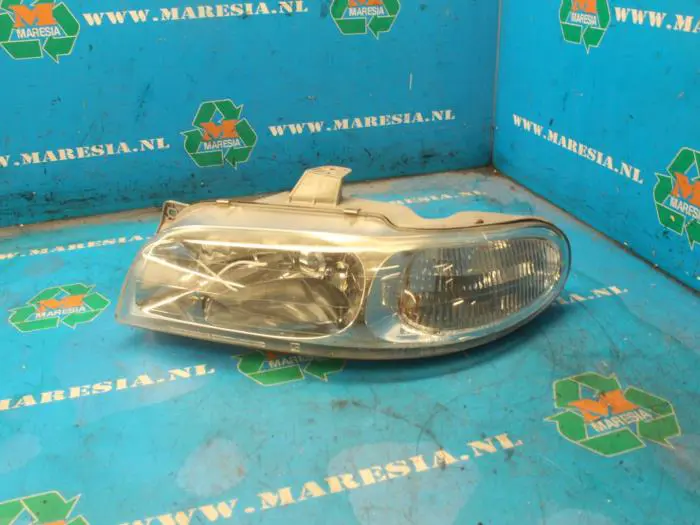 Headlight, left Daewoo Nubira