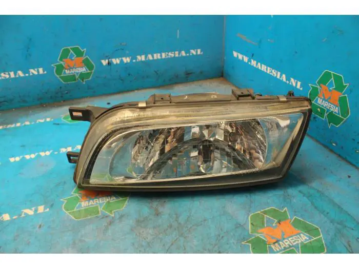 Headlight, left Nissan Almera