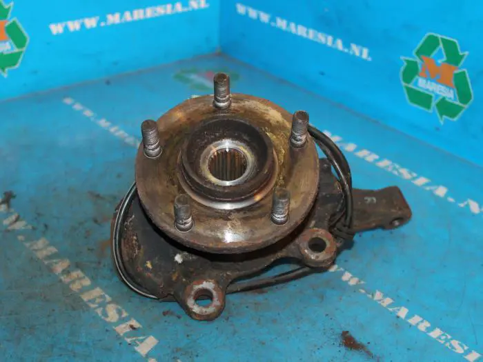 Knuckle, front right Nissan Almera Tino