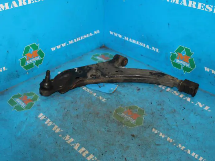 Front lower wishbone, left Toyota Starlet