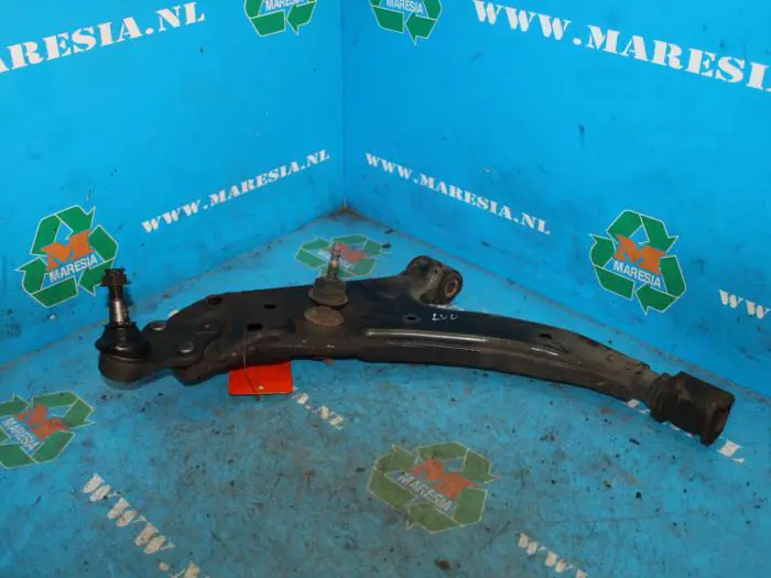 Front lower wishbone, left Toyota Starlet