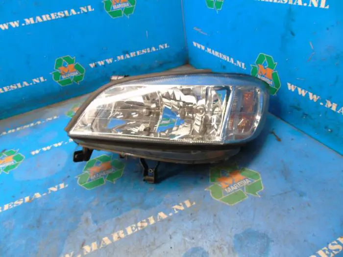 Headlight, left Opel Zafira C