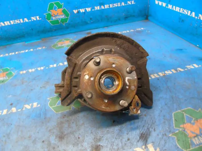 Knuckle, front left Daihatsu Sirion