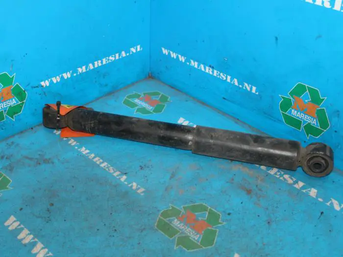 Rear shock absorber, left Volkswagen Caddy