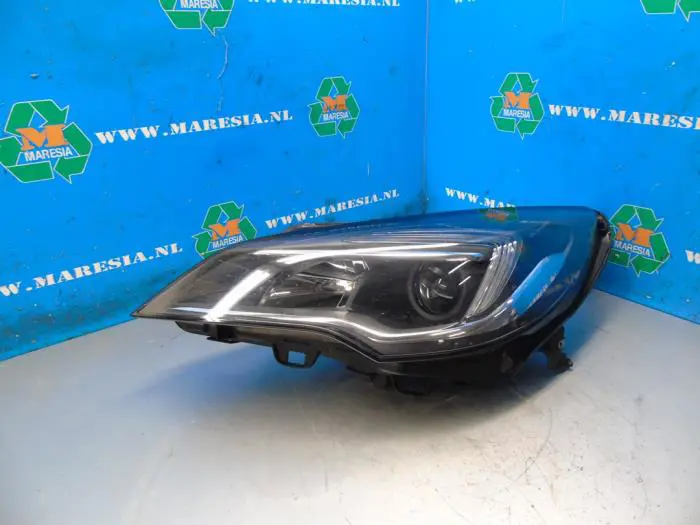 Headlight, left Opel Astra