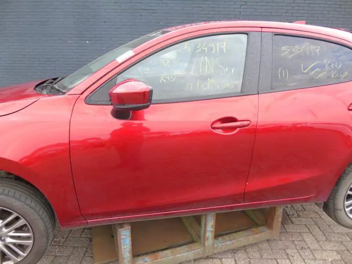 Portier 4Deurs links-voor Mazda 2.