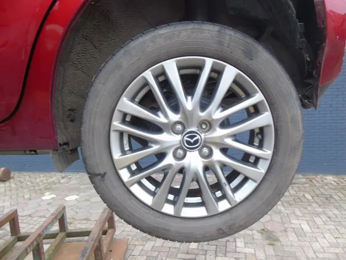 Set of wheels + tyres Mazda 2.