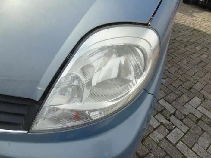 Headlight, left Renault Trafic