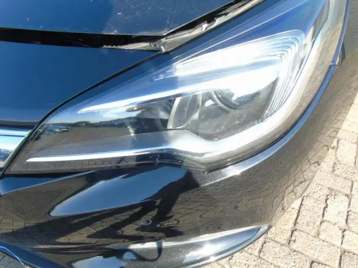 Headlight, left Opel Astra