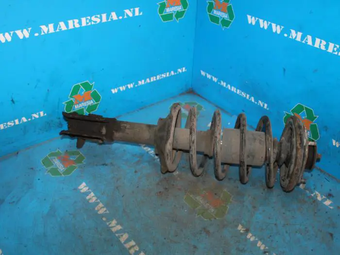 Rear shock absorber rod, left Nissan Sunny