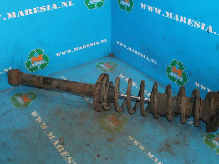 Rear shock absorber, left Volkswagen Passat