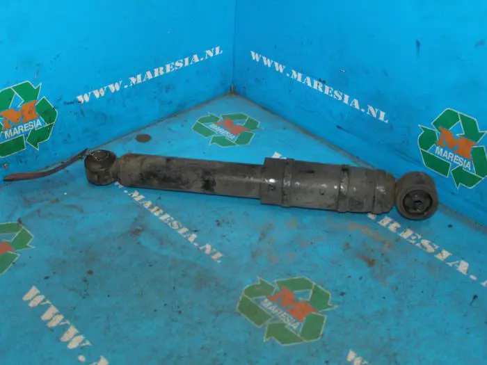 Rear shock absorber, left Opel Astra