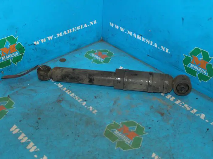 Rear shock absorber, left Opel Astra