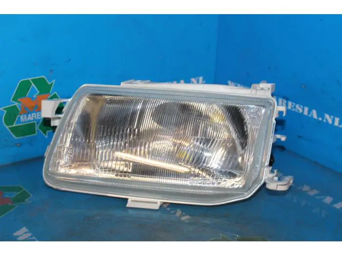 Headlight, left Opel Astra