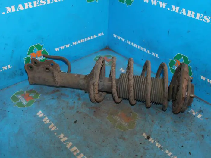 Schokdemperpoot links-voor Nissan Sunny