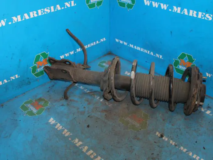 Schokdemperpoot links-voor Nissan Sunny