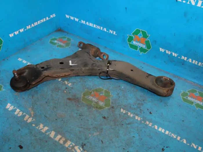 Front lower wishbone, left Kia Cerato