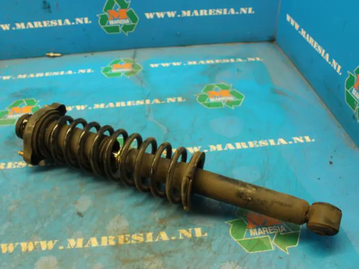 Rear shock absorber rod, left Mitsubishi Space Star