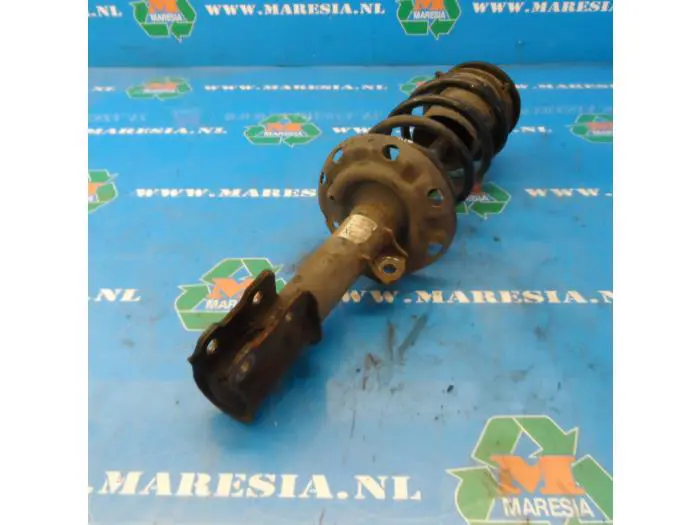 Front shock absorber rod, left Opel Corsa