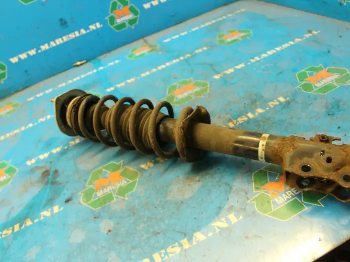 Front shock absorber rod, right Daihatsu Sirion