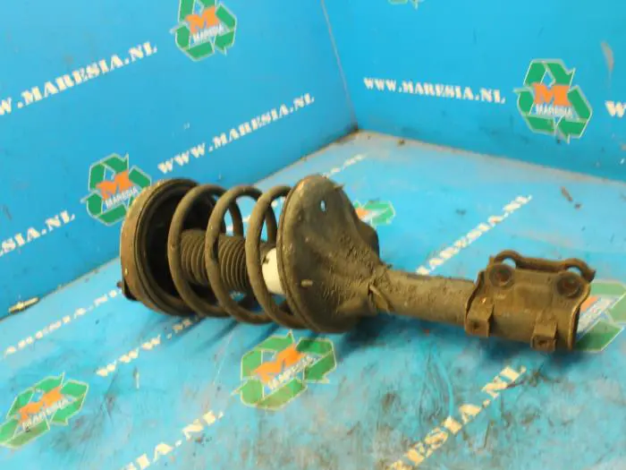 Front shock absorber rod, right Hyundai Coupe