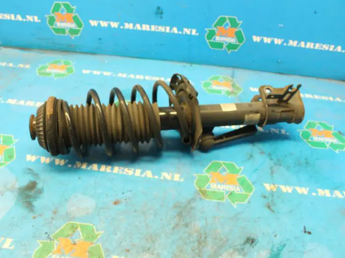 Front shock absorber rod, left Opel Astra