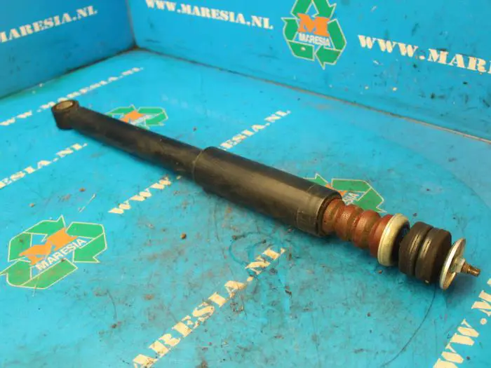 Rear shock absorber, left Opel Agila