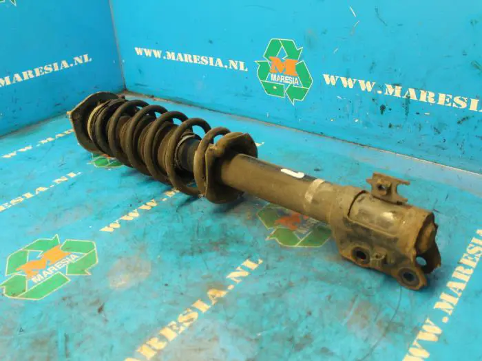 Front shock absorber rod, left Daihatsu Sirion