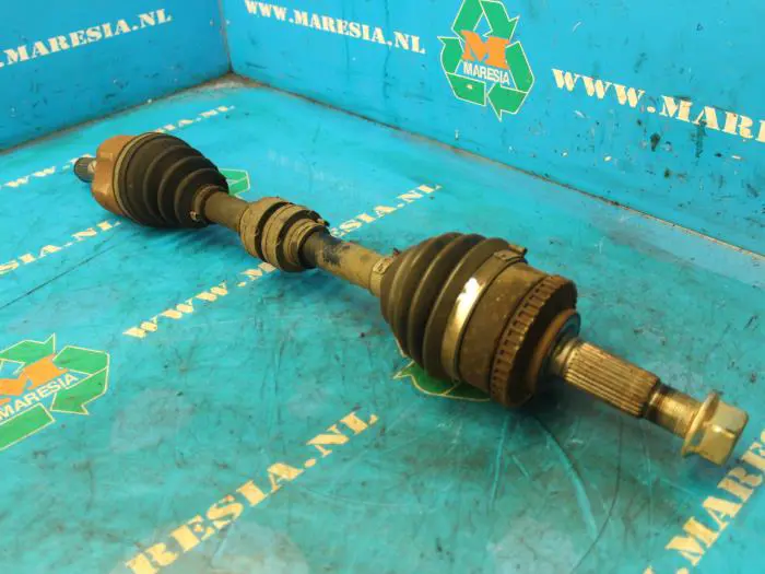 Front drive shaft, left Nissan Primera