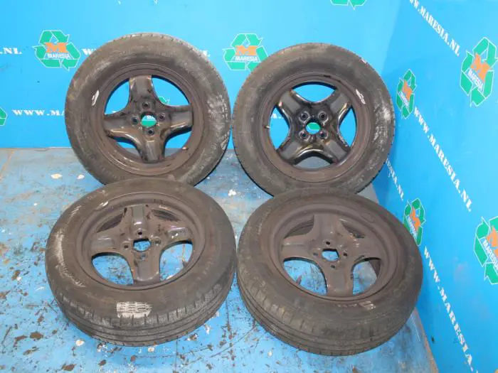 Set of wheels + tyres Opel Corsa