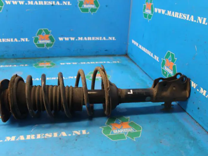 Front shock absorber rod, left Toyota Yaris