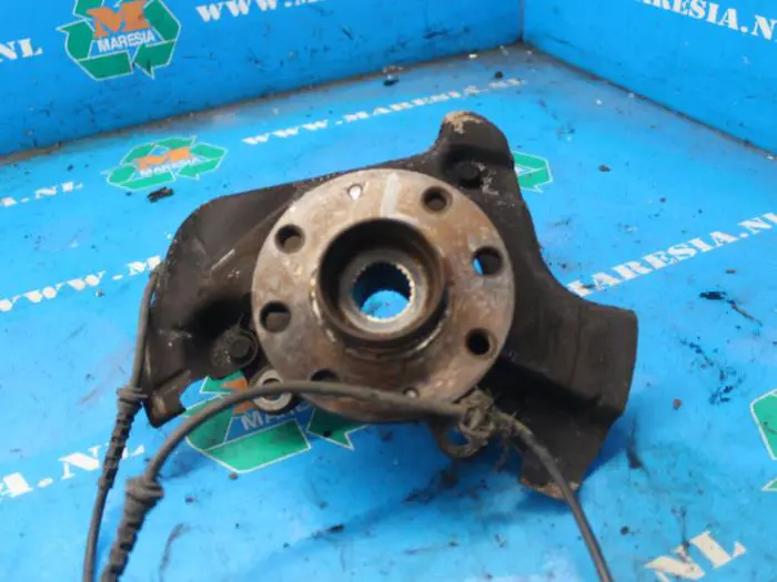 Knuckle, front left Opel Corsa